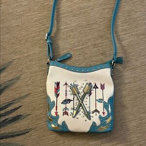 Elegant White and Blue Crossbody Bag with Arrow Design